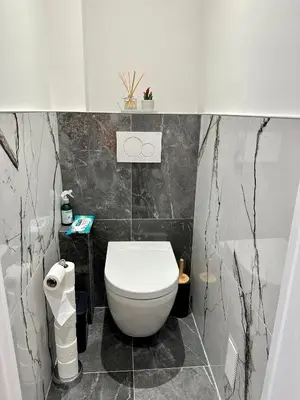 Salle de bains dans l'établissement Appartement 3 chambres - Proche metro