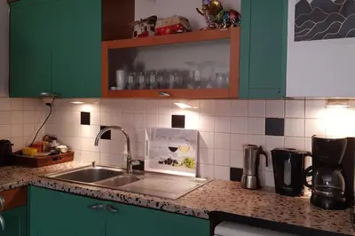 Cuisine ou kitchenette dans l'établissement T4 spécial groupe