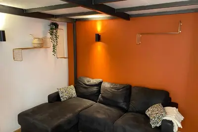 Coin salon dans l'établissement Charming Apartment with Exposed Beams Ainay District Lyon