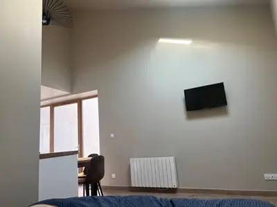 Télévision ou salle de divertissement dans l'établissement Studio 25m2 neuf