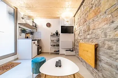 Cuisine ou kitchenette dans l'établissement Le petit Victor Hugo - studio Bellecour