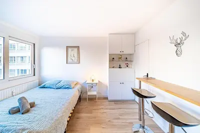Un ou plusieurs lits dans un hébergement de l'établissement Le petit Massena-cosy 2 pers balcon- Part Dieu