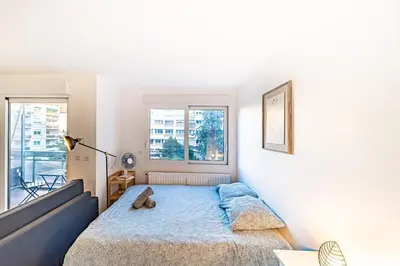 Un ou plusieurs lits dans un hébergement de l'établissement Le petit Massena-cosy 2 pers balcon- Part Dieu