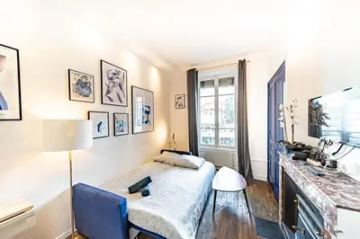 Un ou plusieurs lits dans un hébergement de l'établissement Le Saint blandine - studio proche de Perrache