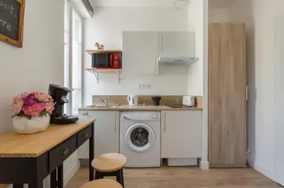 Cuisine ou kitchenette dans l'établissement Gouy's studio - close to subway
