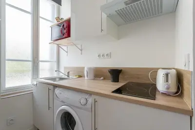 Cuisine ou kitchenette dans l'établissement Gouy's studio - close to subway