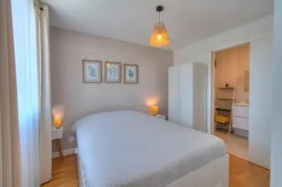 Un ou plusieurs lits dans un hébergement de l'établissement Le Refuge de la Bascule - Charmant appartement Caluire et cuire