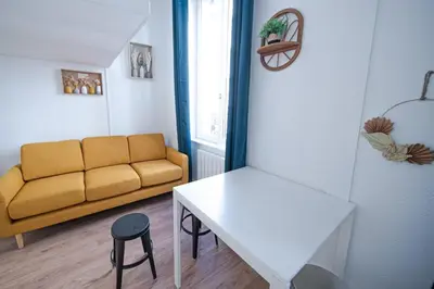 Coin salon dans l'établissement Le Charpennes - Appartement pour 4 personnes proche du métro