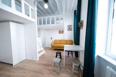 Coin salon dans l'établissement Le Charpennes - Appartement pour 4 personnes proche du métro