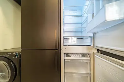 Cuisine ou kitchenette dans l'établissement The Little Lafargue - cozy 3 people - Gratte Ciel
