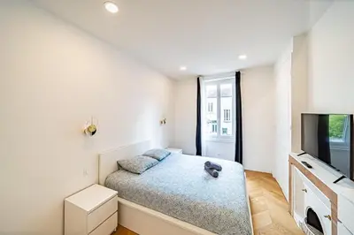 Un ou plusieurs lits dans un hébergement de l'établissement The Little Lafargue - cozy 3 people - Gratte Ciel