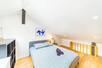 Un ou plusieurs lits dans un hébergement de l'établissement The Buisset cozy 4-person apartment in La Mulatière