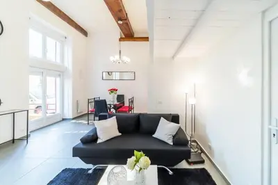Coin salon dans l'établissement The charming Fleury 2 bedrooms Oullins