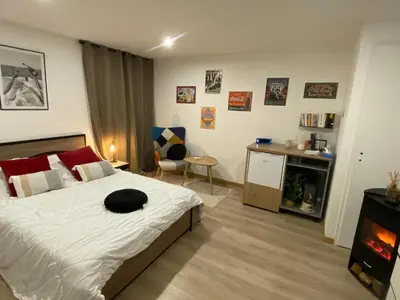 Un ou plusieurs lits dans un hébergement de l'établissement Maison Cosyli