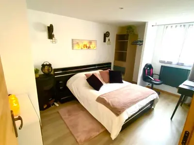 Un ou plusieurs lits dans un hébergement de l'établissement Maison Cosyli