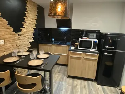 Cuisine ou kitchenette dans l'établissement Maison Cosyli