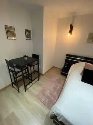 Un ou plusieurs lits dans un hébergement de l'établissement Maison Cosyli