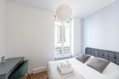 Un ou plusieurs lits dans un hébergement de l'établissement Le Merveilleux - Appt 111m2 au coeur de Lyon