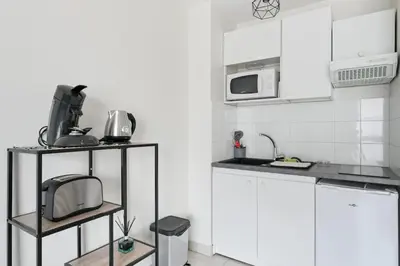 Cuisine ou kitchenette dans l'établissement Chez Antoine cosy 2 people Part dieu