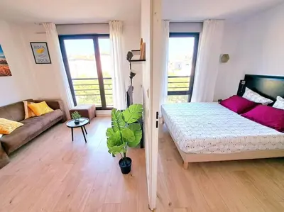Un ou plusieurs lits dans un hébergement de l'établissement Le Valmy: appartement lumineux au pied du métro