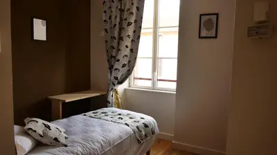 Un ou plusieurs lits dans un hébergement de l'établissement Relais des Monts du Lyonnais