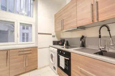 Cuisine ou kitchenette dans l'établissement Duplex de caractère en hypercentre