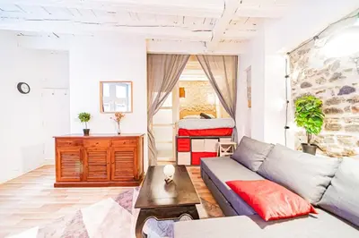 Coin salon dans l'établissement Le Petit St Paul Charming Studio T1 Bis in the heart of Old Lyon