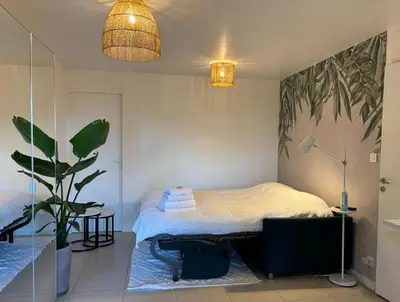 Un ou plusieurs lits dans un hébergement de l'établissement Superbe studio tendance et zen proche de Lyon