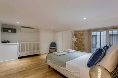 Un ou plusieurs lits dans un hébergement de l'établissement Charlie - Furnished apartment 260m² Downtown Lyon