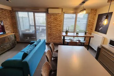 Coin salon dans l'établissement Appartement Voie Lactée Lyon
