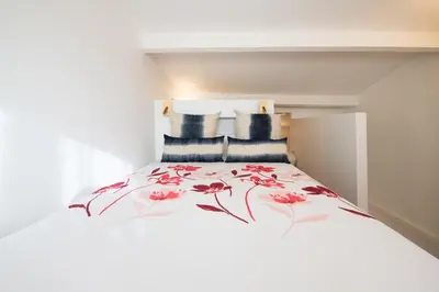 Un ou plusieurs lits dans un hébergement de l'établissement Le Goélette - Superb cosy apartment