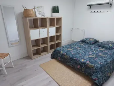 Un ou plusieurs lits dans un hébergement de l'établissement Appartement Golf Confort 83 m2