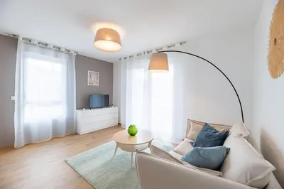 Coin salon dans l'établissement OVELIA Lyon - Les Jardins d'Hortense