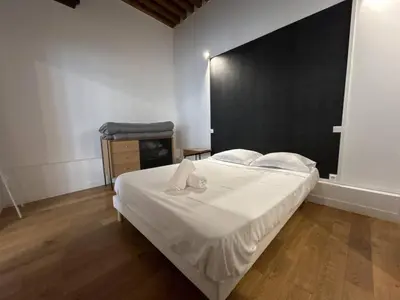 Un ou plusieurs lits dans un hébergement de l'établissement Cosy appt cœur de Lyon du Bœuf 3