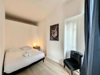 Un ou plusieurs lits dans un hébergement de l'établissement Cosy appart Lyon Part Dieu Félix 2