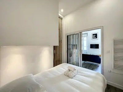Un ou plusieurs lits dans un hébergement de l'établissement Appartement confortable Lyon Part Dieu Felix 1