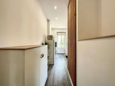 Cuisine ou kitchenette dans l'établissement Appartement confortable Lyon Part Dieu Felix 1