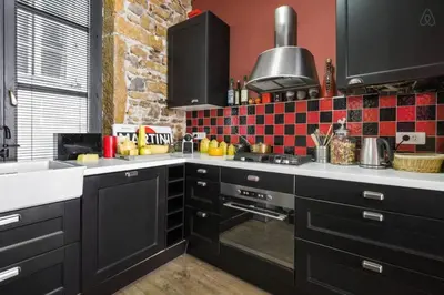 Cuisine ou kitchenette dans l'établissement Montee du change
