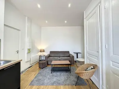 Coin salon dans l'établissement Cosy appt Part Dieu Félix 3