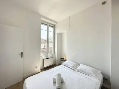 Un ou plusieurs lits dans un hébergement de l'établissement Cosy appt Part Dieu Félix 3