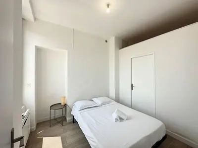 Un ou plusieurs lits dans un hébergement de l'établissement Cosy appt Part Dieu Félix 3