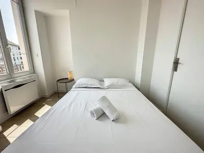 Un ou plusieurs lits dans un hébergement de l'établissement Cosy appt Part Dieu Félix 3