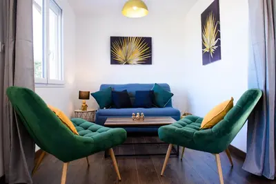 Coin salon dans l'établissement Le Forez Appartement 4 pers ou Studio 2 pers
