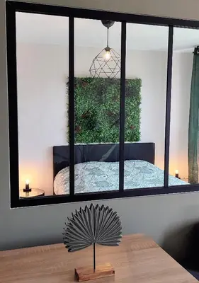 Un ou plusieurs lits dans un hébergement de l'établissement Jungly Appart By Lyonbnb - Eurexpo Moderne Cocooning Calme Nature