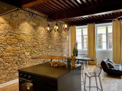 Coin salon dans l'établissement Les Balcons de Guignol