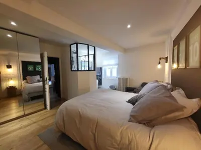 Un ou plusieurs lits dans un hébergement de l'établissement Superbe 100 M2, 4 chambres