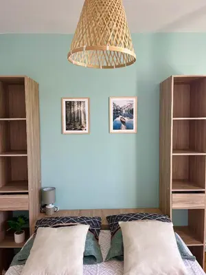 Un ou plusieurs lits dans un hébergement de l'établissement Chambre privée dans un appartement partagé