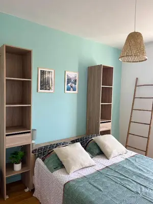 Un ou plusieurs lits dans un hébergement de l'établissement Chambre privée dans un appartement partagé