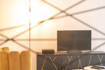 Télévision ou salle de divertissement dans l'établissement KASA ARTY - Tout équipé - Agréable et confortable