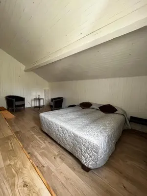 Un ou plusieurs lits dans un hébergement de l'établissement Petite maison dans le beaujolais